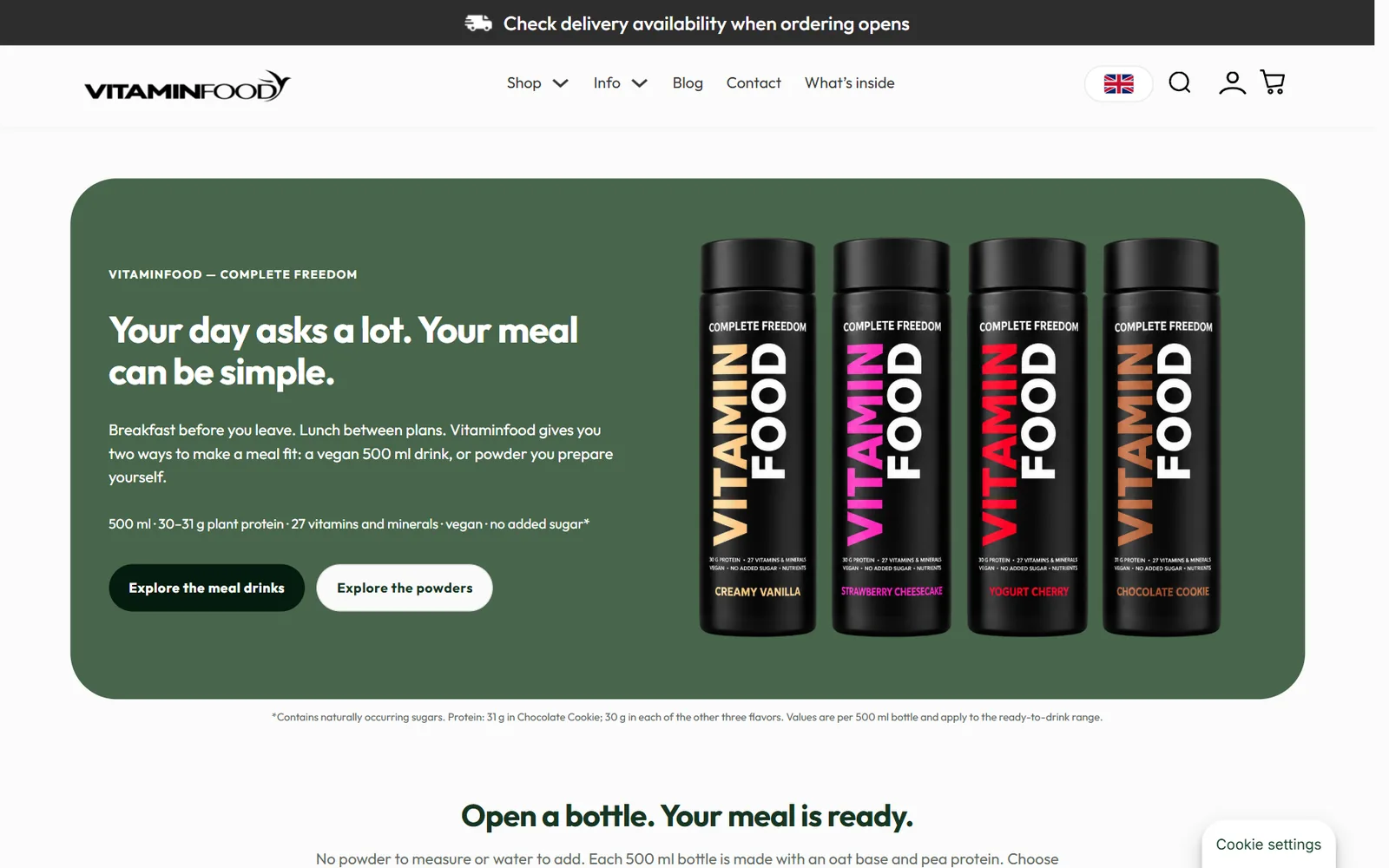 Početna stranica web shopa vitaminfood.com na desktopu: bočice veganskih obroka i poziv na istraživanje formata
